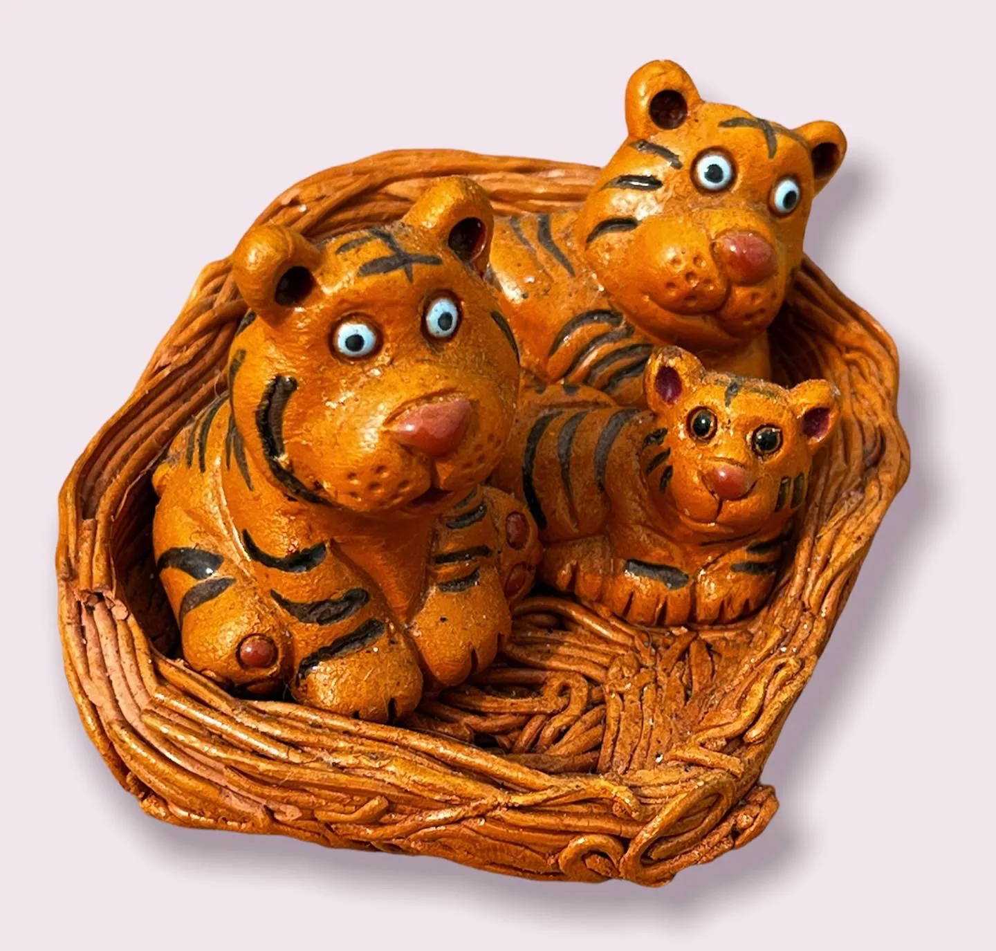 Nid en céramique - famille de Tigre