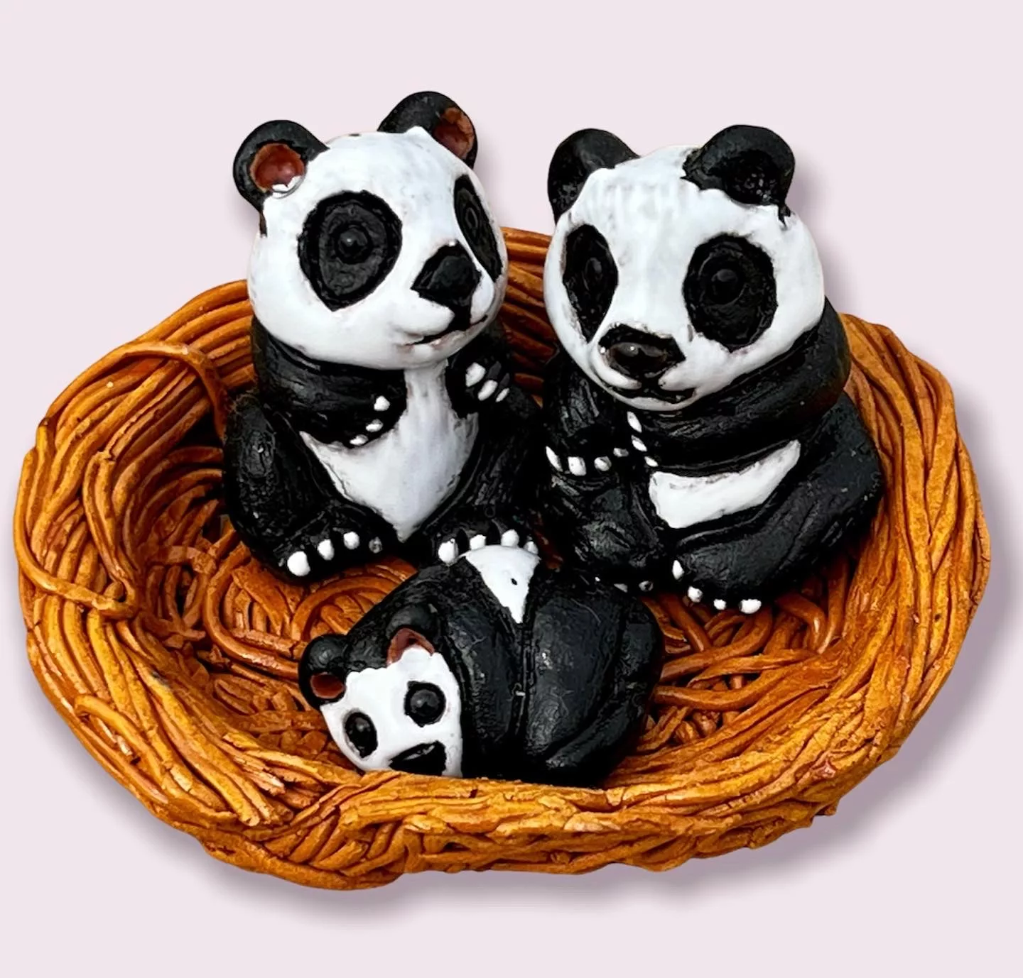 Nid en céramique - famille de Pandas